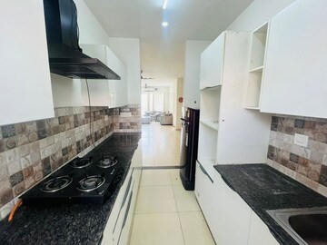 Kitchen in 3 BHK Apartment at Maya Garden City, Lohgarh – for Sale