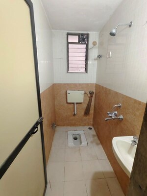 Bathroom in 2 BHK Apartment at Swagat CHS Kharghar, Kharghar Sector 18 – for Rent