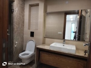 Bathroom in 3 BHK Builder Floor at Defence Colony – for Rent