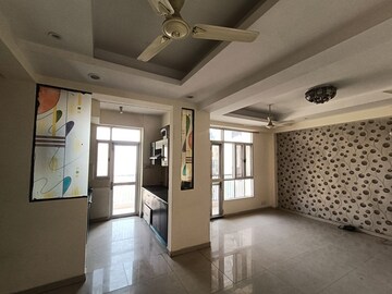 Living Room in 3 BHK Apartment at Prateek Wisteria, Sector 77 – for Sale