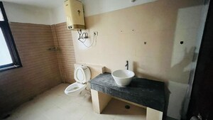 Bathroom in 4 BHK Apartment at Maya Garden City, Lohgarh – for Sale