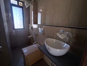 Bathroom in 3 BHK Apartment at Gio Vindhyagiri CHS, Goregaon East – for Rent