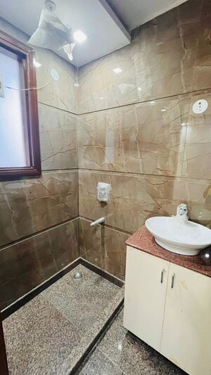 Bathroom in 2 BHK Builder Floor at Kalkaji – for Rent