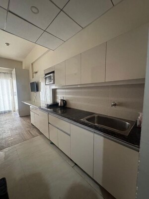 Kitchen in 1 BHK Apartment at Paramount Golfforeste, Zeta I Greater Noida – for Rent