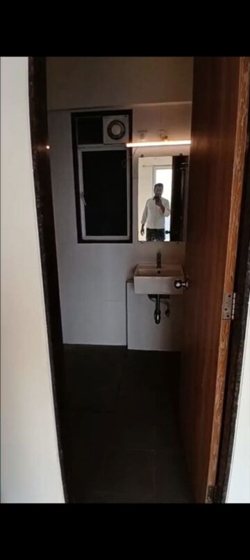 Bathroom in 1 BHK Apartment at Godrej Nest Kandivali, Kandivali East – for Sale