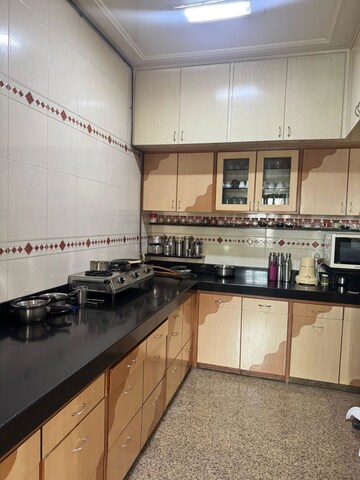Kitchen in 2 BHK Apartment at Happy Valley, Manpada – for Rent