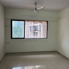 1 BHK Apartment For Sale in Redwoods CHS