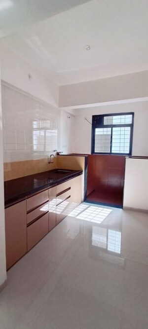Kitchen in 2 BHK Apartment at Royal Ishana, Thergaon – for Rent
