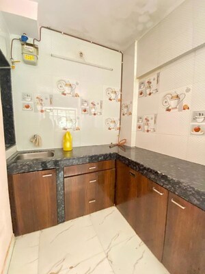 Kitchen in 1 BHK Apartment at Lokpuram CHS, Vasant Vihar – for Rent