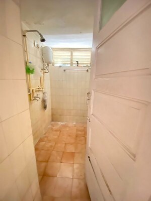 Bathroom in 1 BHK Apartment at Lokpuram CHS, Vasant Vihar – for Rent