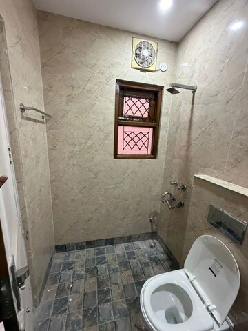 Bathroom in 1 BHK Builder Floor at Kalkaji – for Rent