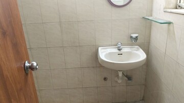 Bathroom in 3 BHK Apartment at Dhawalgiri Apartment Goregaon East, Aarey Colony – for Rent