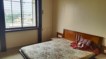 Bedroom in 3 BHK Apartment at Dhawalgiri Apartment Goregaon East, Aarey Colony – for Rent