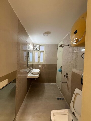Bathroom in 3 BHK Builder Floor at Kalkaji – for Rent