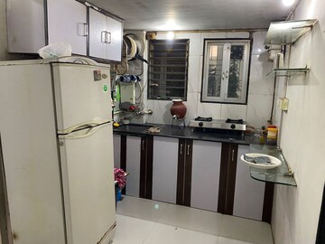 Kitchen in 2 BHK Apartment at Poonam Jewel, Poonam Nagar – for Rent