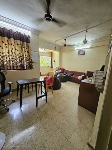 Living Room in 2 BHK Apartment at Assisi Nagar CHS, Chedda Nagar – for Sale