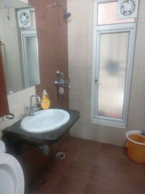 Bathroom in 3 BHK Apartment at Mahagun Mywoods II, Sector 16c Greater Noida – for Rent