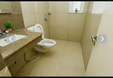Bathroom in 3.5 BHK Apartment at Emaar Palm Gardens, Sector 83 – for Sale