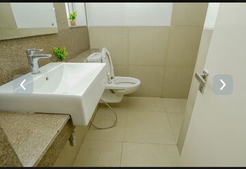 Bathroom in 3.5 BHK Apartment at Emaar Palm Gardens, Sector 83 – for Sale