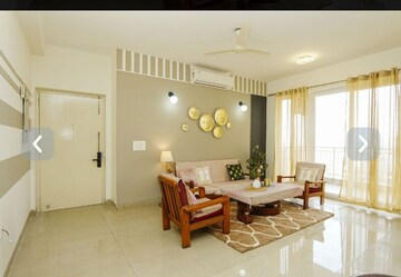 Living Room in 3.5 BHK Apartment at Emaar Palm Gardens, Sector 83 – for Sale