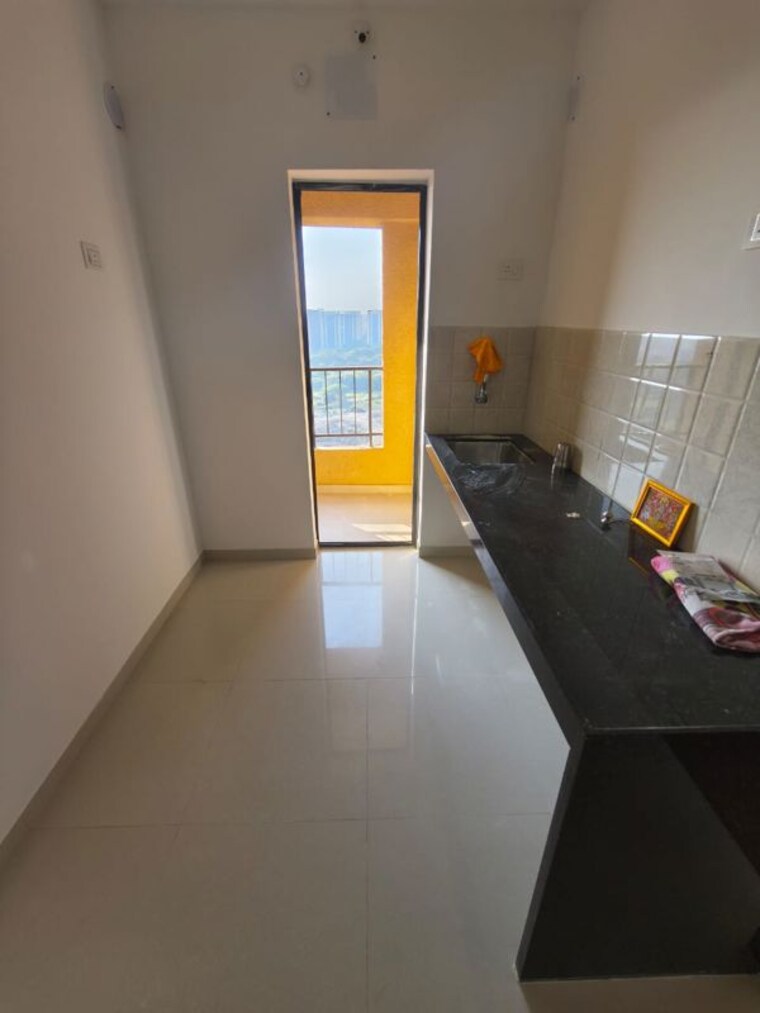 Kitchen, shapoorji-pallonji-joyville-celestia 1 Bedroom 430 Sq.Ft. Apartment In Hadapsar Pune 9920121