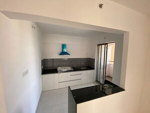 Kitchen in 2 BHK Apartment at Pride World City Wellington, Charholi Budruk – for Rent