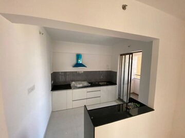 Kitchen in 2 BHK Apartment at Pride World City Wellington, Charholi Budruk – for Rent