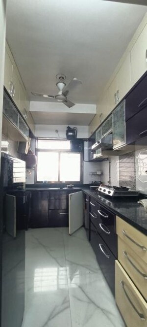 Kitchen in 3 BHK Apartment at Sai Everest Solitaire Heights, Santacruz East – for Rent
