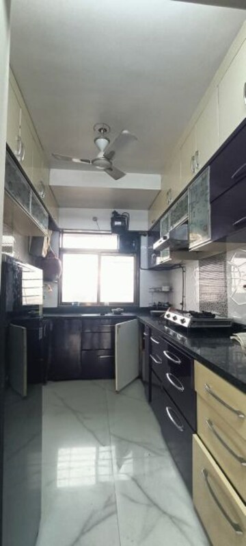 Kitchen in 3 BHK Apartment at Sai Everest Solitaire Heights, Santacruz East – for Rent