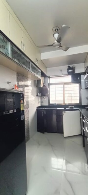 Kitchen in 3 BHK Apartment at Sai Everest Solitaire Heights, Santacruz East – for Rent
