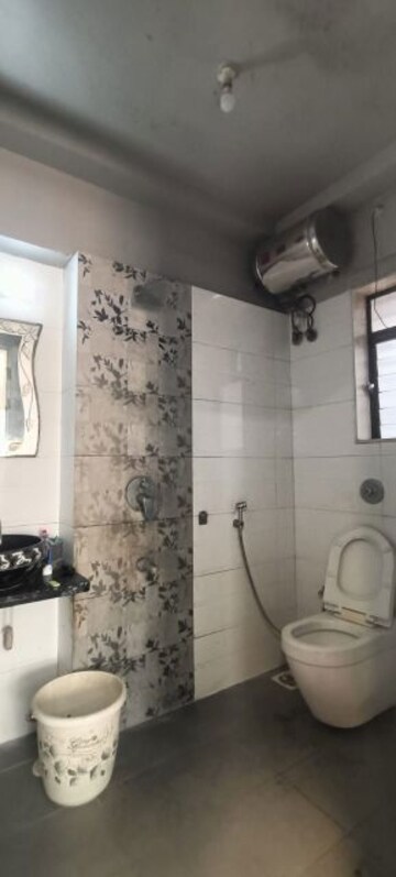 Bathroom in 3 BHK Apartment at Sai Everest Solitaire Heights, Santacruz East – for Rent