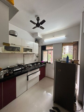 Kitchen in 1 BHK Apartment at Raunak Bliss, Ghodbunder Road – for Rent