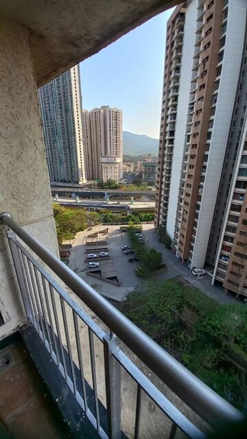 Balcony in 1 BHK Apartment at Unnati Woods CHS, Kasarvadavali – for Rent