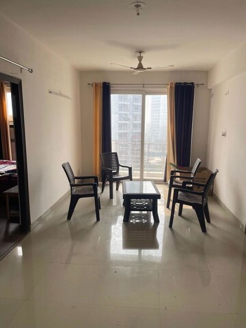 Living Room in 2 BHK Apartment at Urban Axis Urban Woods, Sushant Golf City – for Rent