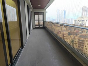 Balcony in 4 BHK Apartment at Dynamix Woodlands Apartment, Malad East – for Rent