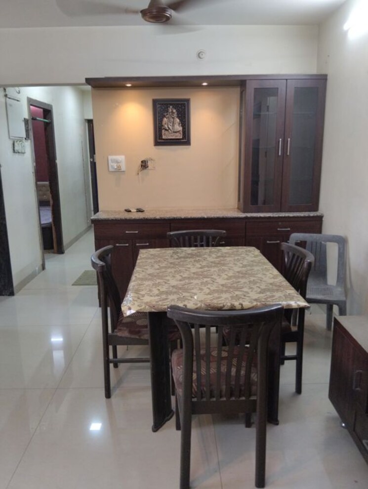 Dining area, tharwani-rosewood-heights 3 Bedroom 1450 Sq.Ft. Apartment In Kharghar Sector 10 Navi Mumbai 9821587