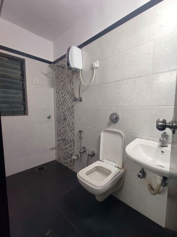 Bathroom in 2 BHK Apartment at Landmark CHS Malad, Malad West – for Rent
