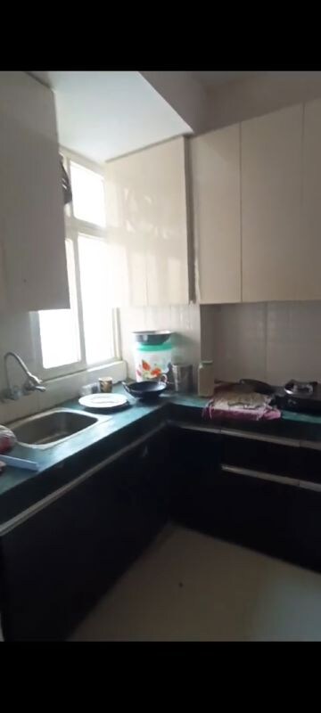 Kitchen in 1 BHK Apartment at Shree Vardhman Green Court, Sector 90 – for Rent
