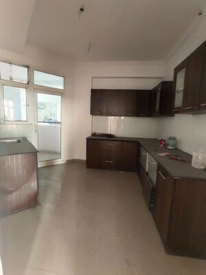 Kitchen in 3 BHK Apartment at Ramprastha Pearl Court, Vaishali Sector 7 – for Sale