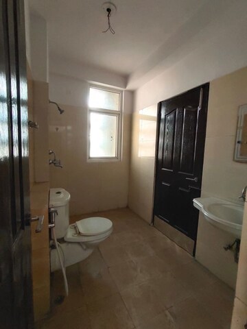 Bathroom in 3 BHK Apartment at Ramprastha Pearl Court, Vaishali Sector 7 – for Sale