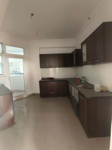 Kitchen in 3 BHK Apartment at Ramprastha Pearl Court, Vaishali Sector 7 – for Sale