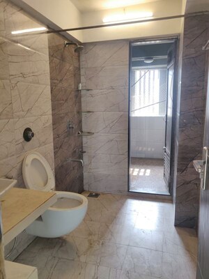 Bathroom in 3 BHK Apartment at Lashkaria Green Height, Jogeshwari West – for Rent