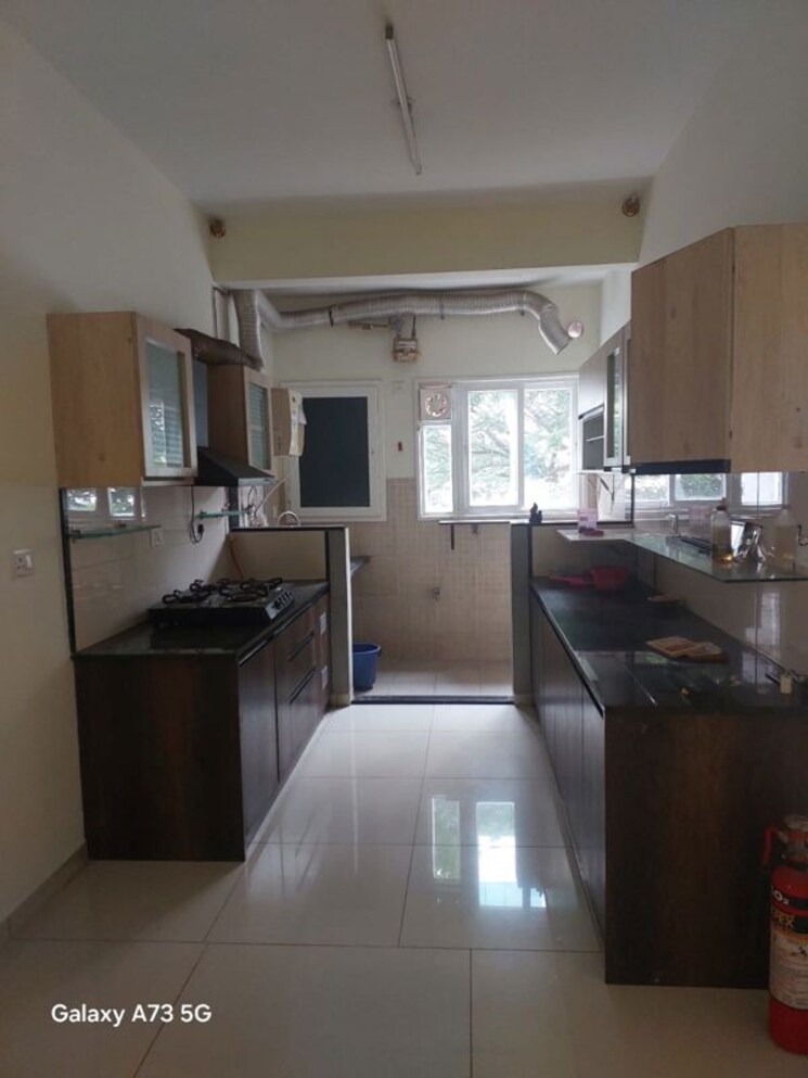 Kitchen, l-t-raintree-boulevard 2.5 Bedroom 1450 Sq.Ft. Apartment In Hebbal Bangalore 9920806