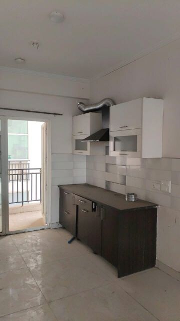 Kitchen in 3 BHK Apartment at Amrapali Terrace Homes, Tech Zone 4 Greater Noida – for Sale