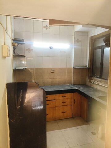 Kitchen in 1 BHK Apartment at Sankeshwar Residency, Kalyan West – for Sale