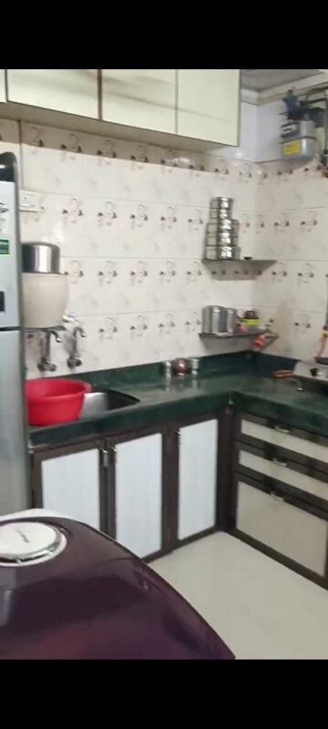 Kitchen in 1 RK Apartment at Shantinagar CHS, Mira Road – for Sale