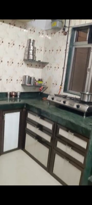 Kitchen in 1 RK Apartment at Shantinagar CHS, Mira Road – for Sale