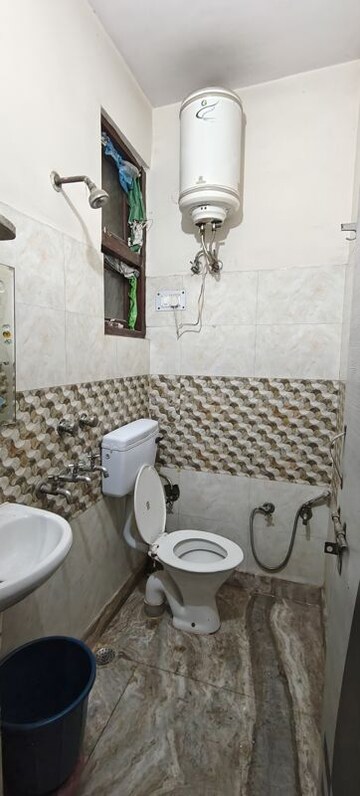 Bathroom in 1 BHK Builder Floor at Pandav Nagar – for Rent