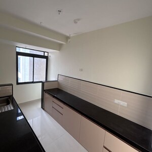 Kitchen in 2 BHK Apartment at Dynamix Divum, Riddhi Gardens – for Rent