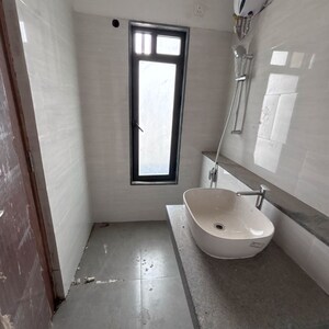 Bathroom in 2 BHK Apartment at Dynamix Divum, Riddhi Gardens – for Rent